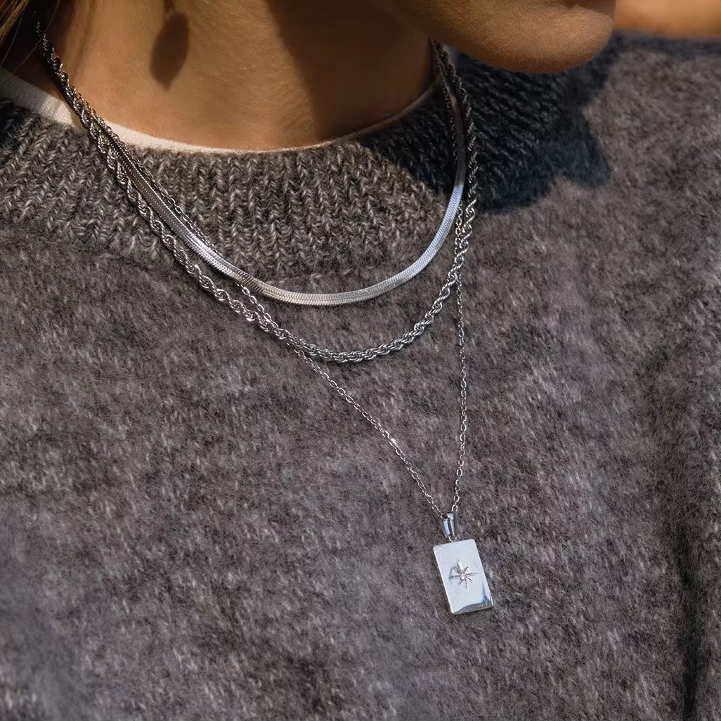 Celestia Luxe Triple-Layer Star Pendant Necklace – Silver Stainless Steel