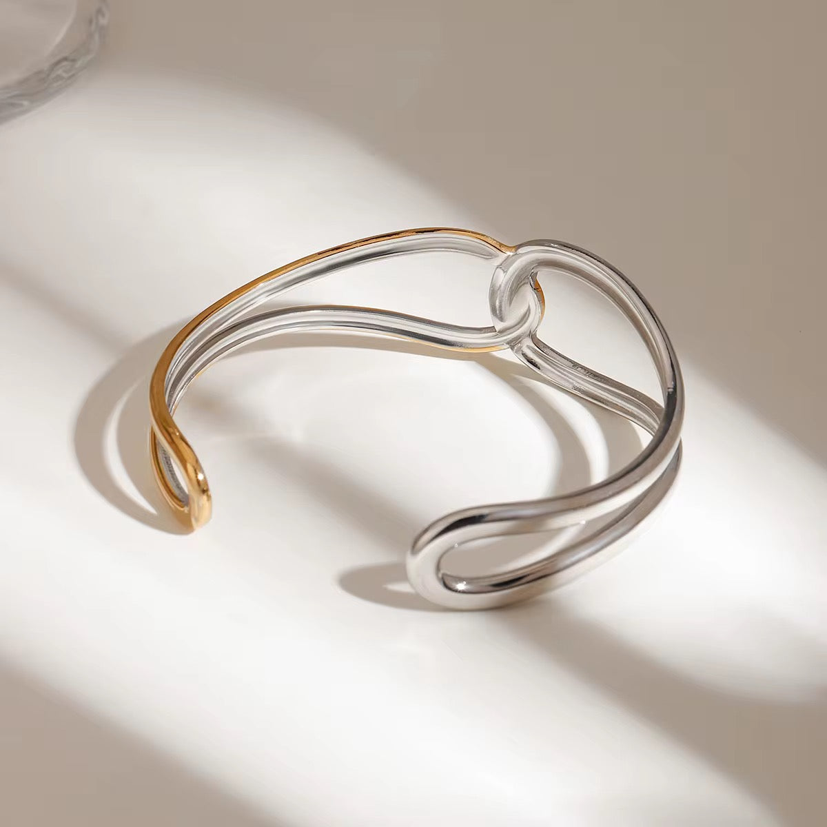 The Aurora Knot Bangle