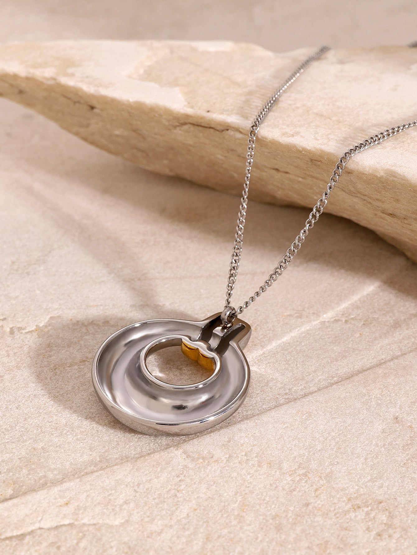 LUXOR Dual - Tone Halo Pendant - 18K Gold PVD on Stainless Steel