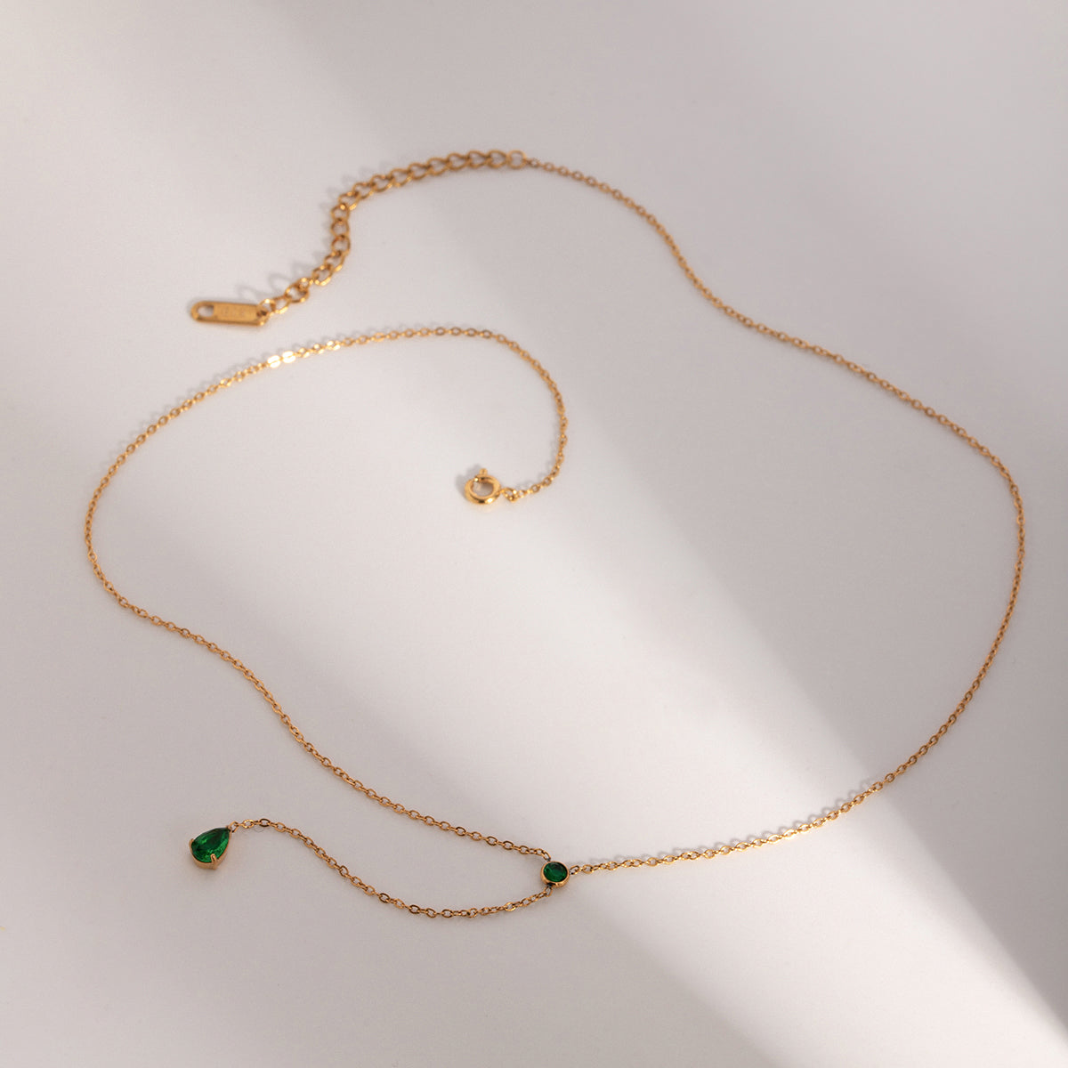 Celestial Cascade – 18K Gold Y-Shaped Pendant Necklace with Green Cubic Zirconia