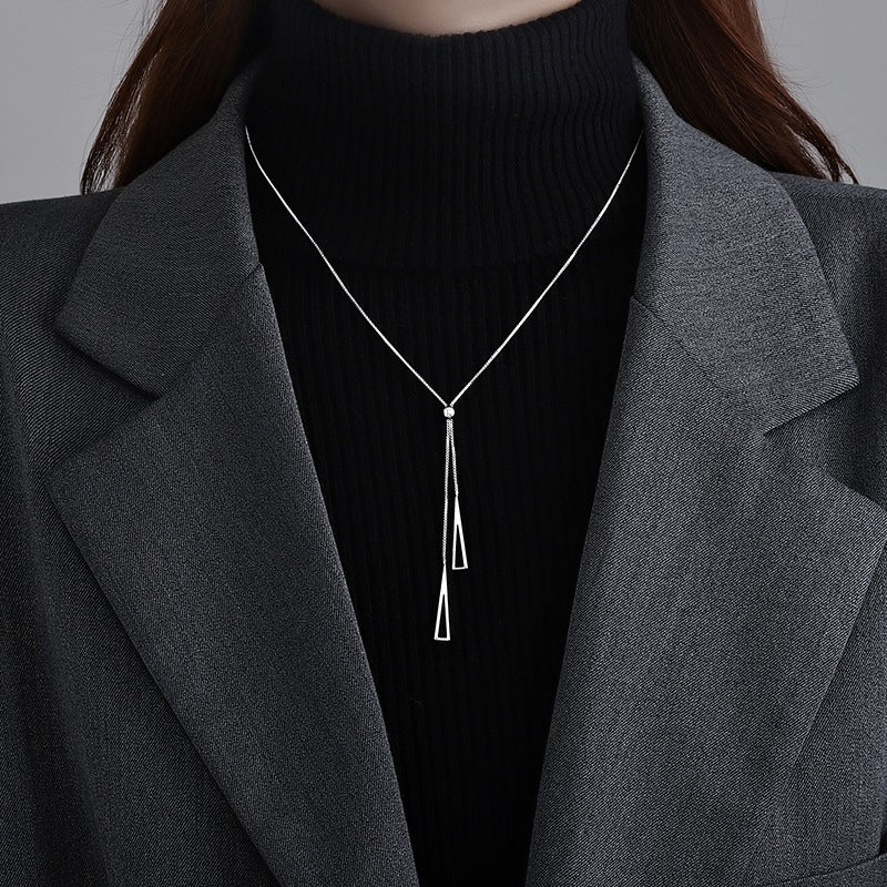 Sleek Triangle Tassel Necklace – Platinum Plated Stainless Steel