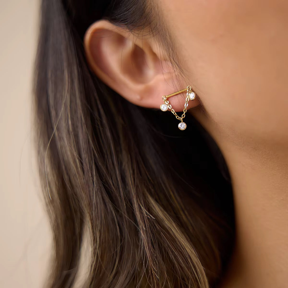 Élané Gold Zircon Tassel Earrings