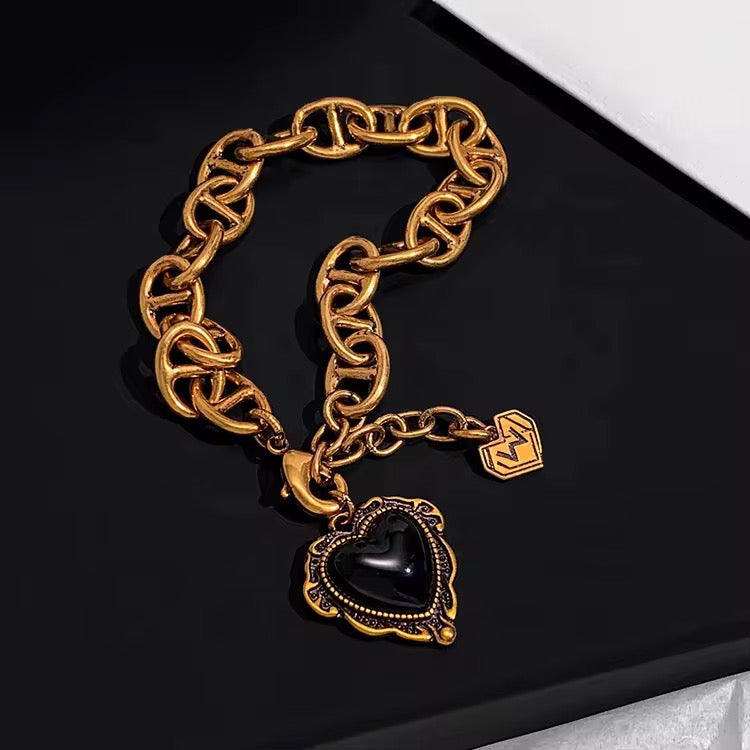 Veloura Noir Heart Charm Bracelet – Antique Gold Plated Statement Chain